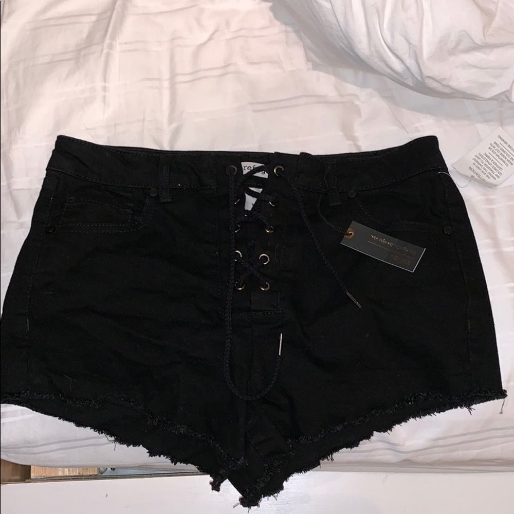 Tied black shorts